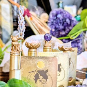 CottageCoreHolly Witch Divination Hinge Head Bundle displayed with natural elements: cat with lavender, lotus bowl with rose, salt bowl, and crescent moon crystal stand